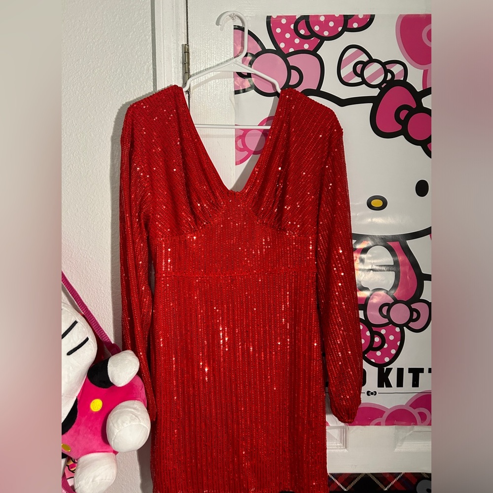 bright red, plunging neckline, long sleeve sequin dress
